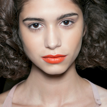 How to Wear Orange Lipstick Without Looking Like a Pumpkin