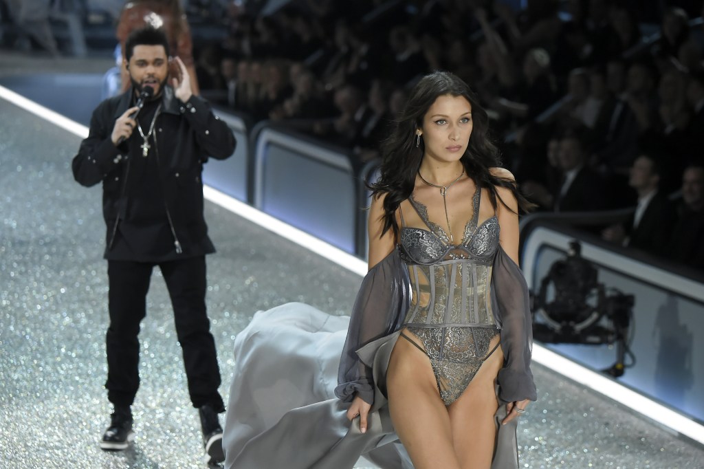 PARIS, FRANCE - NOVEMBER 30: Bella Hadid and The Weeknd are seen together on stage during the Victoria's Secret Fashion Show on November 30, 2016 in Paris, France. (Photo by Kristy Sparow/WireImage)