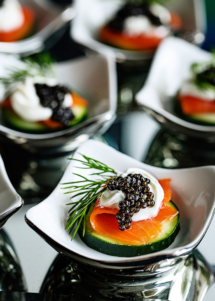 STYLECASTER | 25 Festive Recipes That Will Impress Your Friends on New Year’s Eve | Cucumber Slices with Smoked Salmon, Creme Fraiche, and Caviar