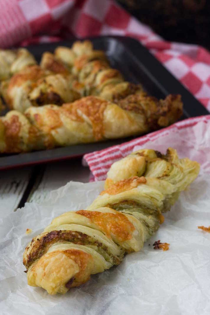 STYLECASTER | 25 Festive Recipes That Will Impress Your Friends on New Year’s Eve | Pesto Cheese Twists