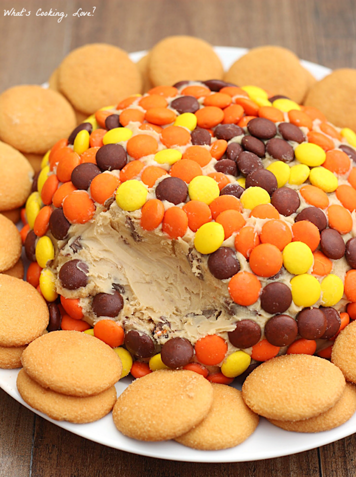 STYLECASTER | 13 Cheese Balls That Will Steal the Show at Every Party | Reese's Peanut Butter Cookie Dough Cheese Ball