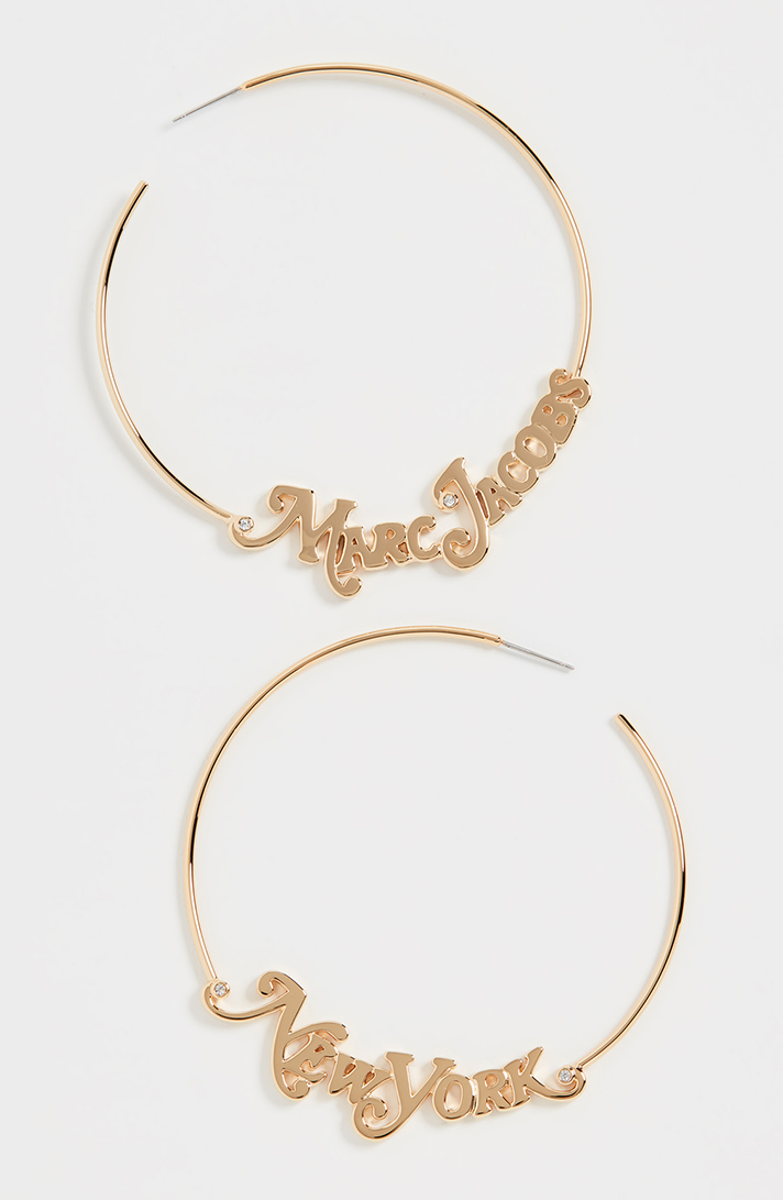 STYLECASTER | Word and Name Jewelry Is Having a Moment, Because Carrie Bradshaw Is a Forever Fashion Icon