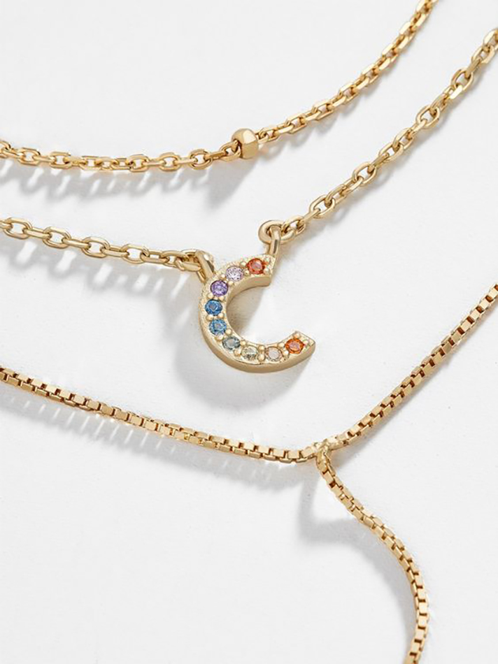 STYLECASTER | Word and Name Jewelry Is Having a Moment, Because Carrie Bradshaw Is a Forever Fashion Icon