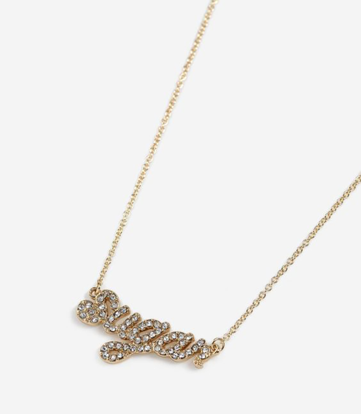 STYLECASTER | Word and Name Jewelry Is Having a Moment, Because Carrie Bradshaw Is a Forever Fashion Icon