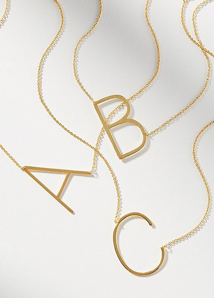 STYLECASTER | Word and Name Jewelry Is Having a Moment, Because Carrie Bradshaw Is a Forever Fashion Icon