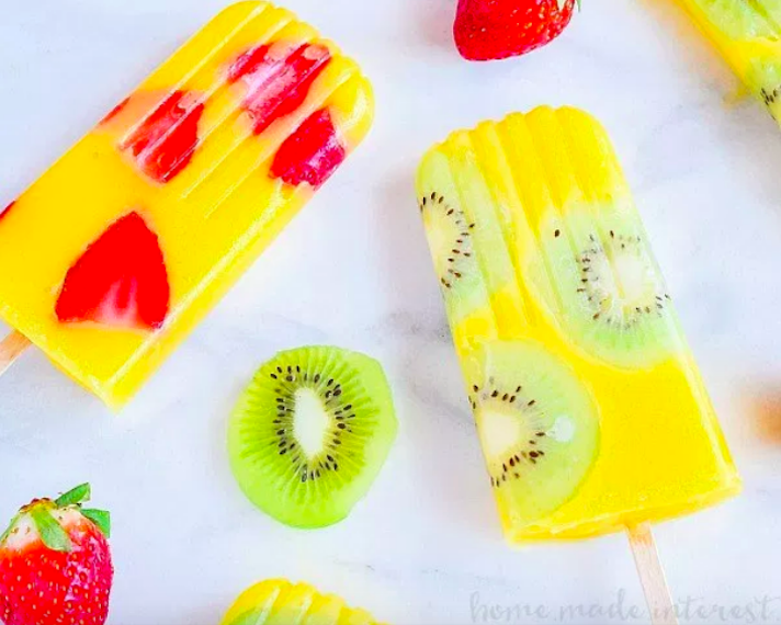 STYLECASTER | 17 DIY Popsicles To Make With All That Summer Fruit | Mango Popsicles