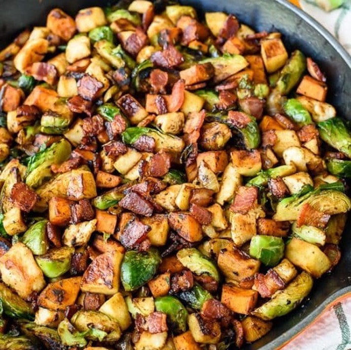 STYLECASTER | Easy Weeknight Chicken Recipes That Are Perfect for Fall | Harvest Chicken Skillet with Sweet Potatoes Brussels Sprouts and Sautéed Apples
