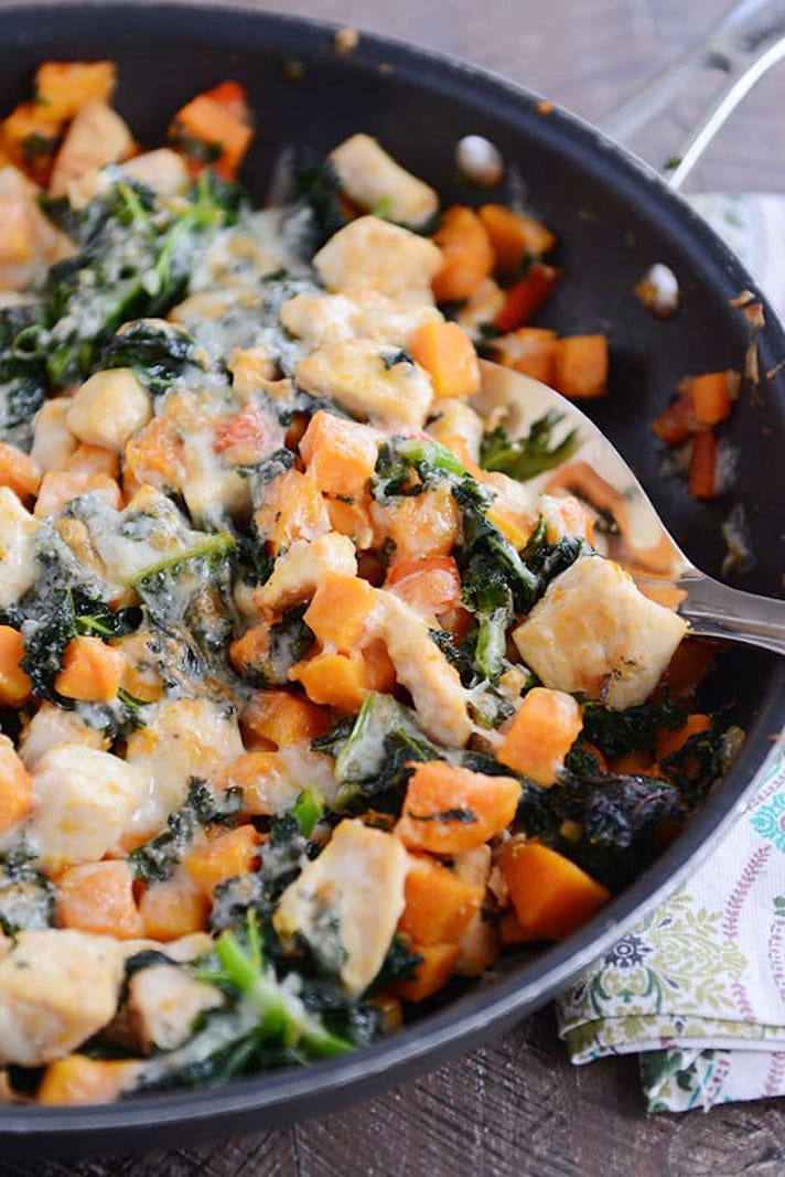STYLECASTER | Easy Weeknight Chicken Recipes That Are Perfect for Fall | Cheesy Chicken Kale and Sweet Potato Skillet