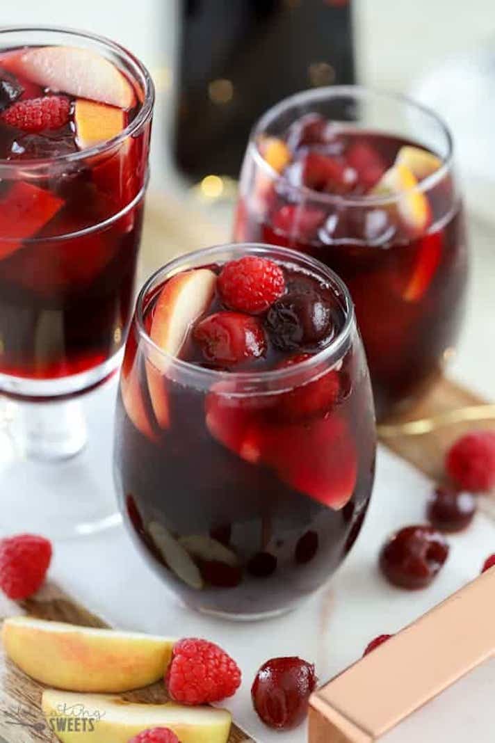 STYLECASTER | 15 Big-Batch Holiday Cocktails You Can Make With Boxed Wine | Red Wine Cherry Sangria