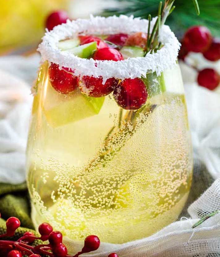 STYLECASTER | 15 Big-Batch Holiday Cocktails You Can Make With Boxed Wine | White Christmas Sangria