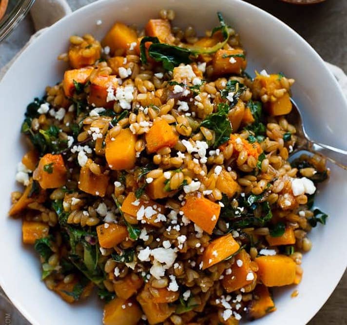 STYLECASTER | 17 Winter Vegetable Recipes That Will Make You Feel Great | Roasted Butternut Squash Salad With Kale, Farro, and Cranberry Dressing