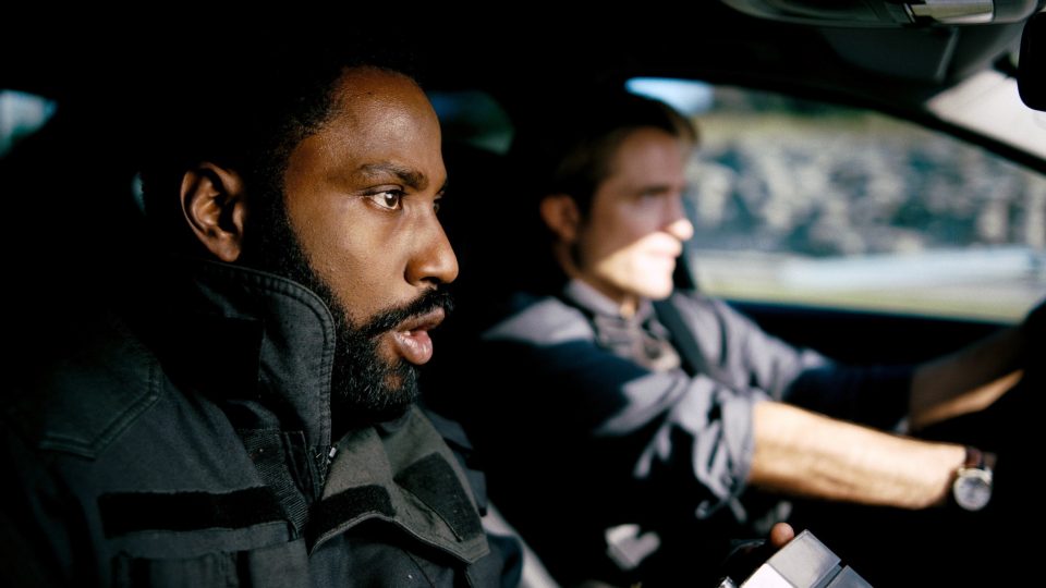 TENET, from left: John David Washington, Robert Pattinson, 2020.