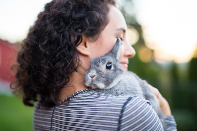 Woman with her pet rabbit