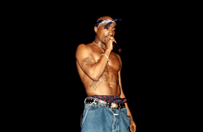CHICAGO - MARCH 1994:  Rapper Tupac Shakur performs at the Regal Theater in Chicago, Illinois in March 1994.  (Photo By Raymond Boyd/Getty Images)