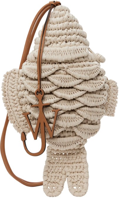 A raffia fish bag with a leather handle