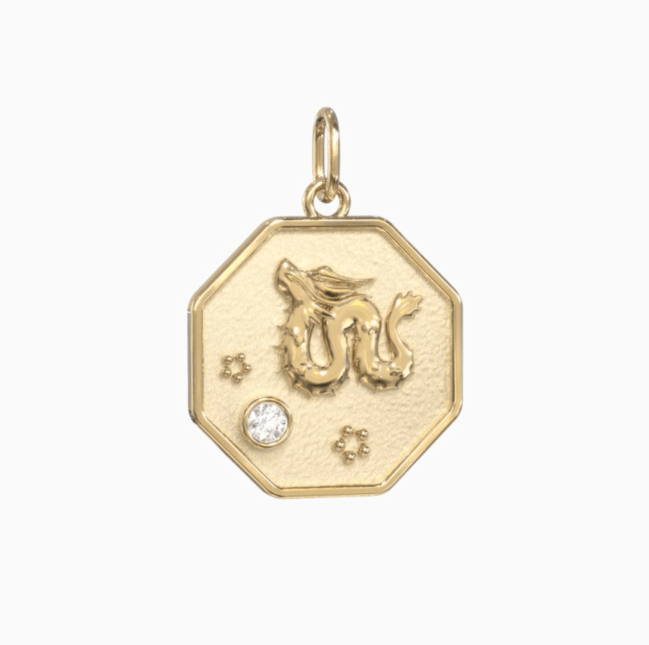 A gold dragon charm with a customizable jewel from Lee Fiori