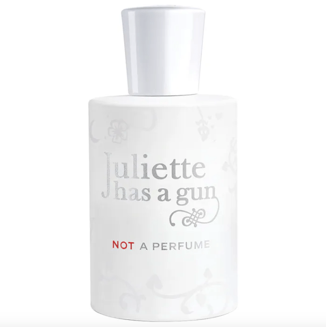 Not A Perfume Juliette Has A Gun in a white opaque bottle with a white cap, the bottle has the perfume's name in silver writing.