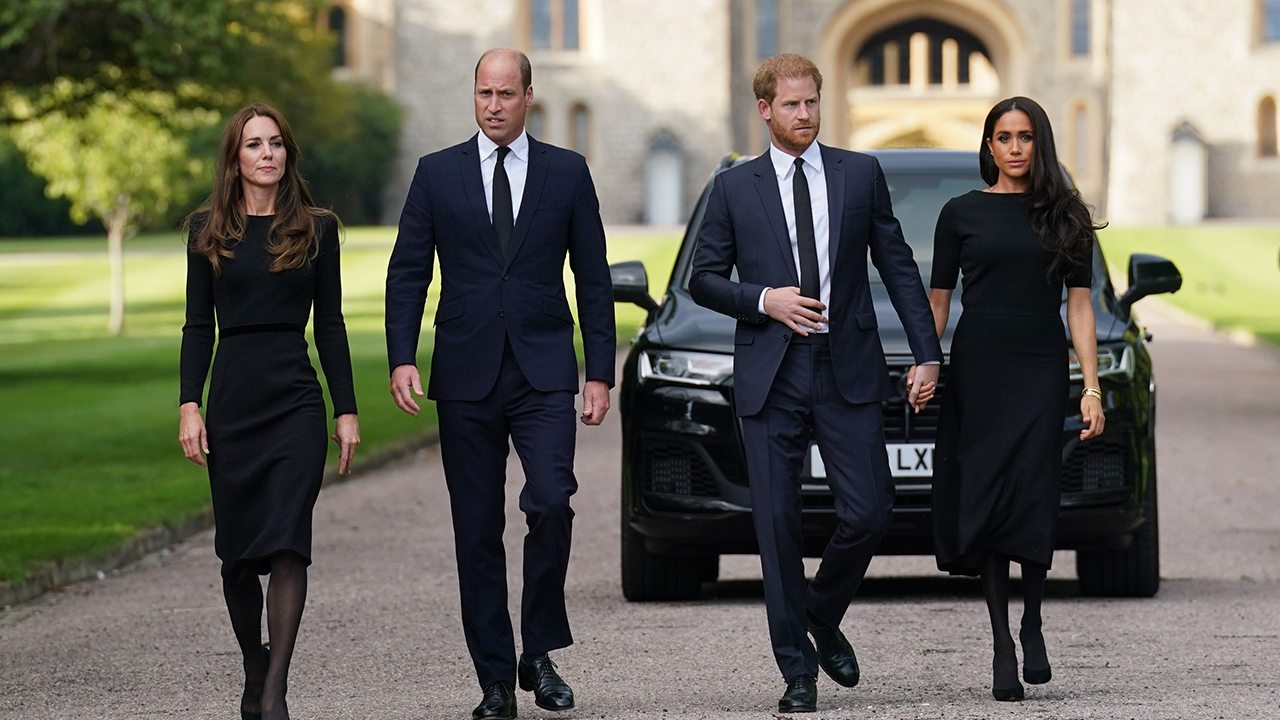 Kate Middleton, Prince William, Prince Harry, and Meghan Markle dressed in all black.