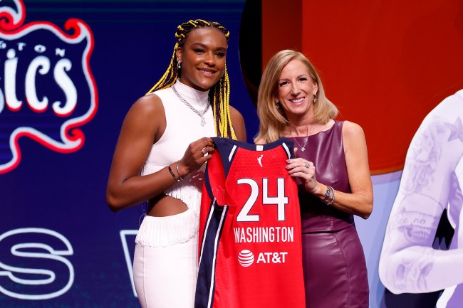 NEW YORK, NEW YORK - APRIL 15: Aaliyah Edwards poses with WNBA Commissioner Cathy Engelbert after being selected sixth overall pick by the Washington Mystics during the 2024 WNBA Draft at Brooklyn Academy of Music on April 15, 2024 in New York City.