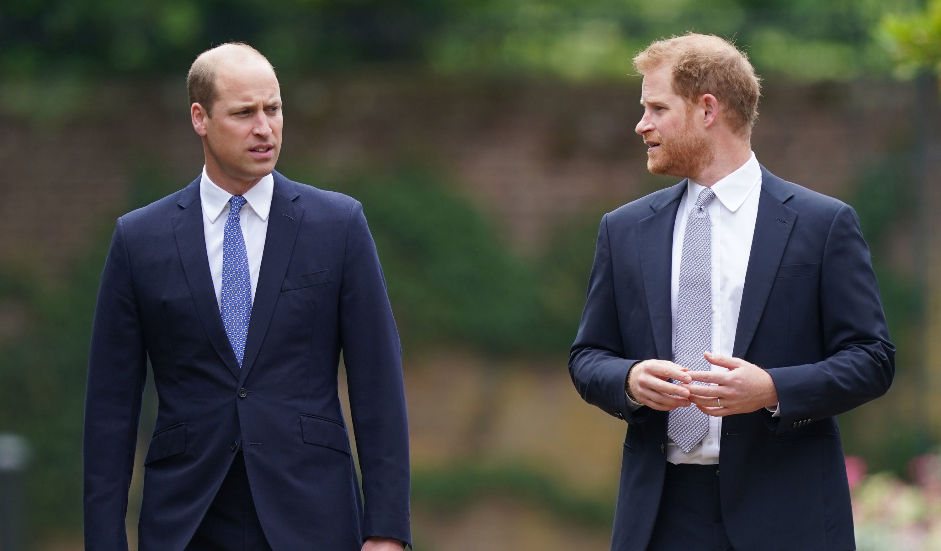 Prince William, Duke of Cambridge (left) and Prince Harry, Duke of Sussex arrive for the unveiling of a statue they commissioned of their mother Diana, Princess of Wales, in the Sunken Garden at Kensington Palace, on what would have been her 60th birthday on July 1, 2021 in London, England. Today would have been the 60th birthday of Princess Diana, who died in 1997. At a ceremony here today, her sons Prince William and Prince Harry, the Duke of Cambridge and the Duke of Sussex respectively, will unveil a statue in her memory.