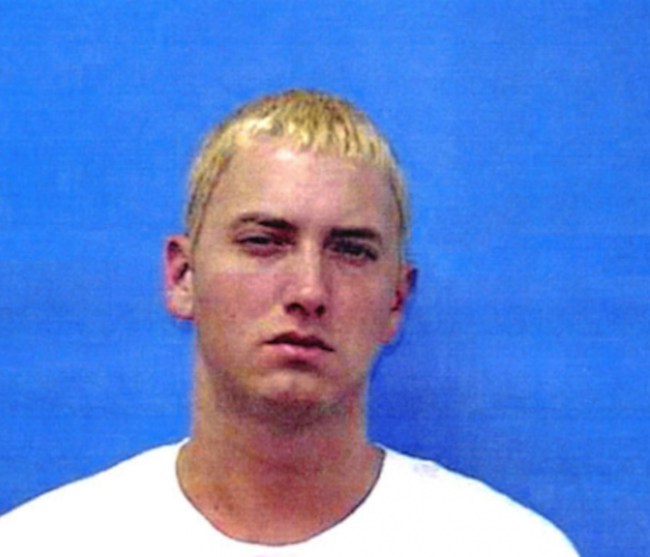 In this handout, American rapper, songwriter, record producer, record executive, film producer, and actor Eminem (Marshall Mathers) in a mug shot following his arrest, Warren, Michigan, US, 4th June 2000.