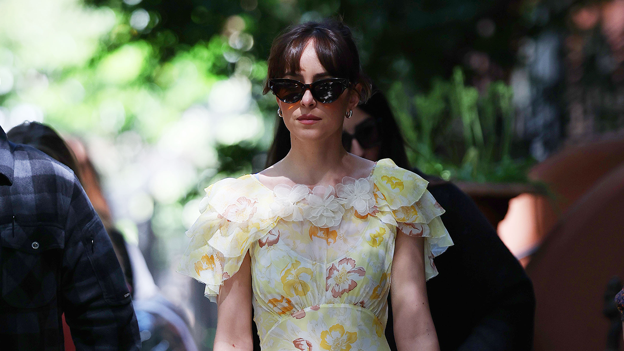 Dakota Johnson wearing a floral dress.
