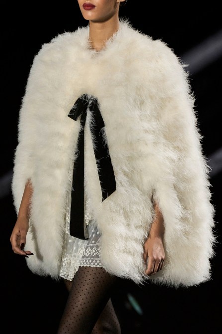 A model wearing a fur coat.