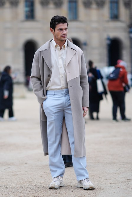 STYLECASTER | Men's Minimalist Outfits, grey trench, slacks, sneakers