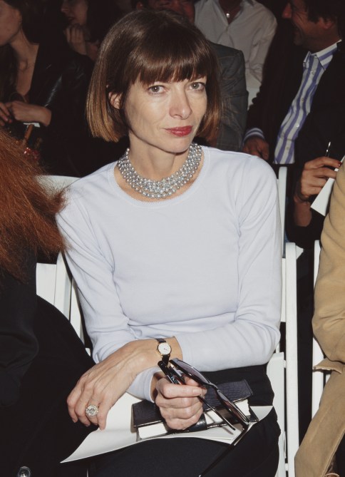 English editor-in-chief of American Vogue, Anna Wintour, at a show being held during Fashion Week, Bryant Park, New York City, USA, April 1997.
