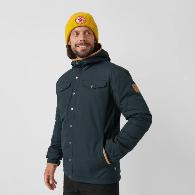 A model wearing the Fjallraven Greenland No. 1 Down Jacket in navy