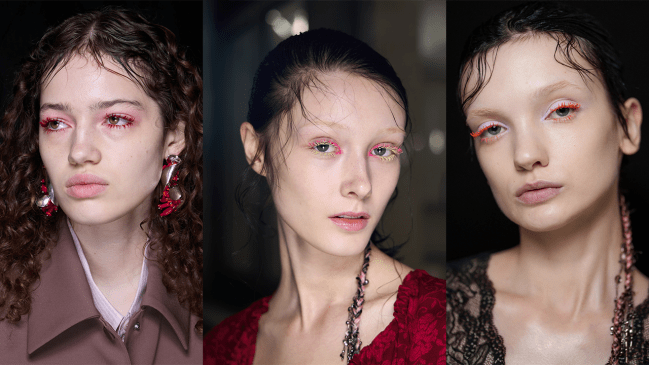 Models wearing colorful mascara.