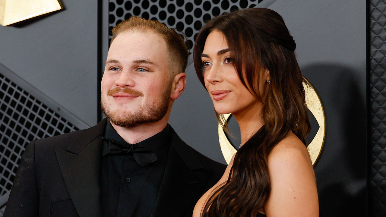 Los Angeles, CA - February 04: Zach Bryan and Brianna LaPaglia arrive on the Red Carpet at the Crypto.com Arena  in Los Angeles, CA, Sunday, Feb. 4, 2024.