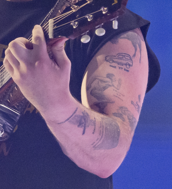 DETROIT, MICHIGAN - JUNE 20: Zach Bryan performs in support of his "The Quittin Time Tour 2024" at Ford Field on June 20, 2024 in Detroit, Michigan.