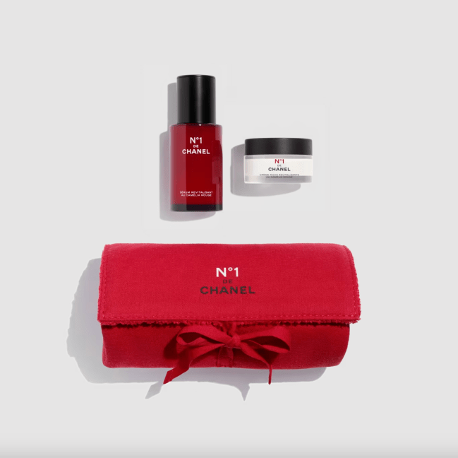Two Chanel skincare products and a red pouch.
