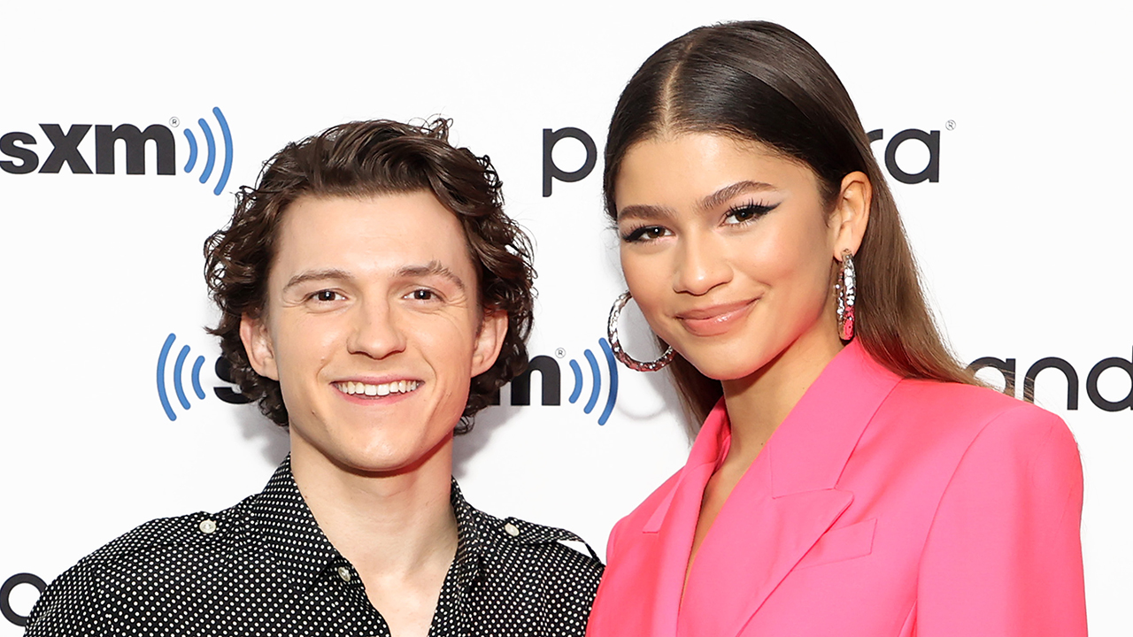 Tom Holland and Zendaya attend SiriusXM's Town Hall with the cast of Spider-Man: No Way Home on December 10, 2021 in New York City
