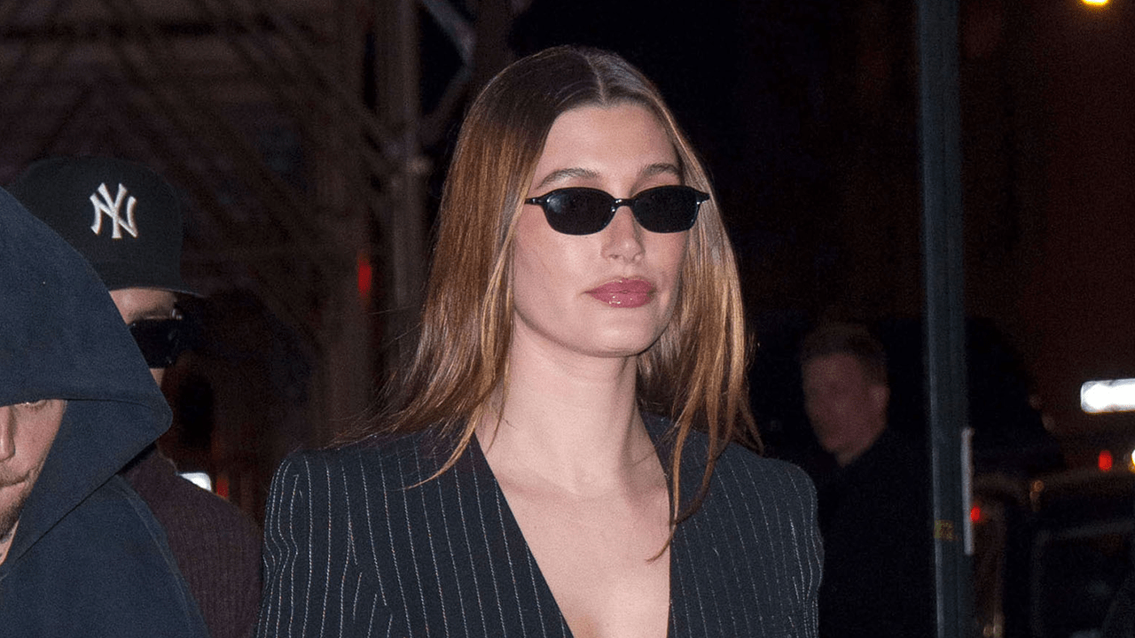 Hailey Bieber wearing the Rhode Peptide Lip Shape.