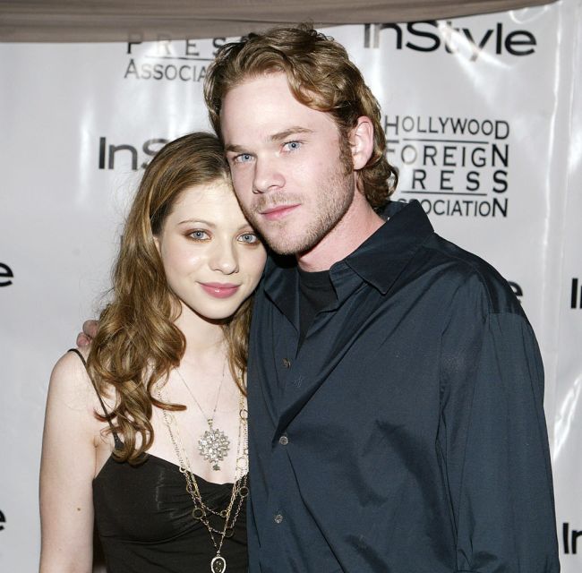 TORONTO, CANADA - SEPTEMBER 13:  Michelle Trachtenberg and Shawn Ashmore at the In Style party during the 29th Annual Toronto International Film Festival in Toronto, Canada, September 13, 2004.