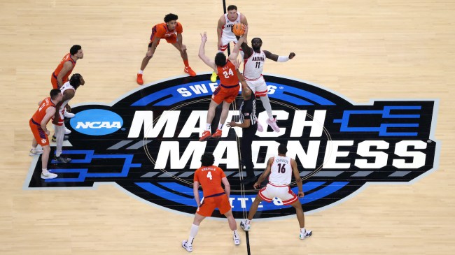 LOS ANGELES, CALIFORNIA - MARCH 28: Oumar Ballo #11 of the Arizona Wildcats and PJ Hall #24 of the Clemson Tigers jump for the opening tip off during the NCAA Men's Basketball Tournament West Regional at Crypto.com Arena on March 28, 2024 in Los Angeles, California. (Photo by Harry How/Getty Images)