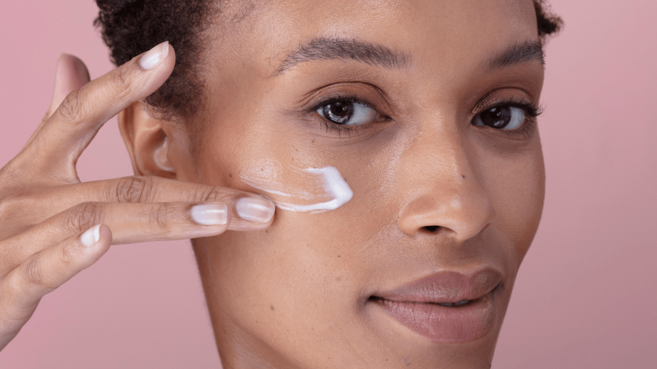 woman using face cream