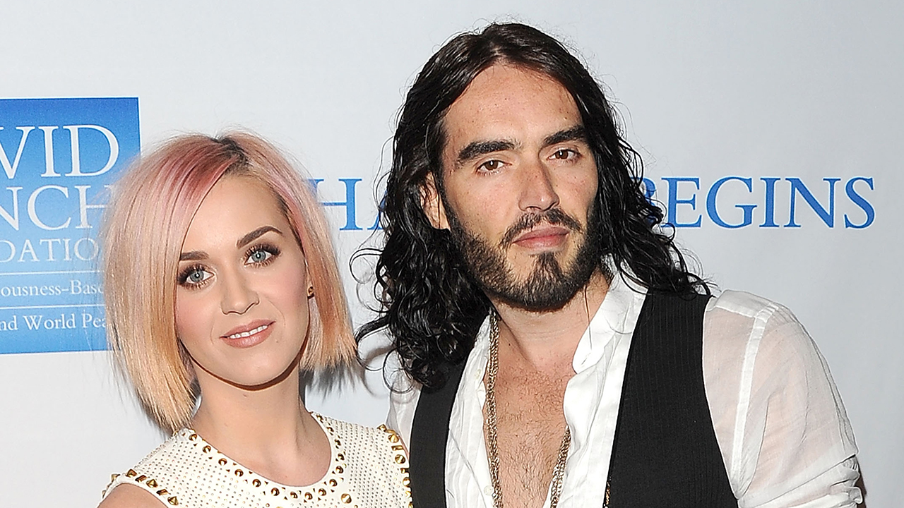 LOS ANGELES, CA - DECEMBER 03:  Singer Katy Perry (L) and actor Russell Brand attend the 3rd Annual "Change Begins Within" Benefit Celebration presented by The David Lynch Foundation held at LACMA on December 3, 2011 in Los Angeles, California.