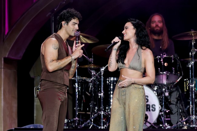 EAST RUTHERFORD, NEW JERSEY - AUGUST 10: (L-R) Joe Jonas and Demi Lovato perform onstage during the Jonas Brothers: JONAS20 Greetings From Your Hometown tour kick off at Met Life Stadium on August 10, 2025 in East Rutherford, New Jersey.