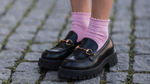 Lea Naumann wearing rose socks, Gucci black loafer on May 31, 2022 in Berlin, Germany.