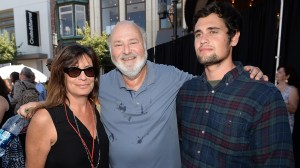 LOS ANGELES, CA - AUGUST 09: Actor/Producer/Director Rob Reiner (center) and wife Michele Singer (L) and son Nick Reiner (R) attend Teen Vogue's Back-to-School Saturday kick-off event at The Grove on August 9, 2013 in Los Angeles, California.