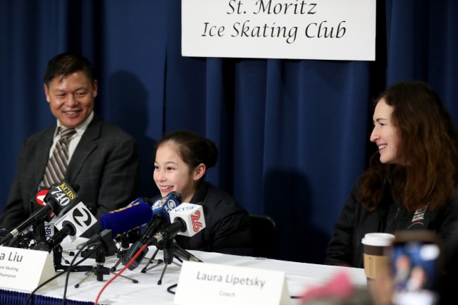 OAKLAND, CALIFORNIA - JANUARY 31: Alysa Liu, 13, of Richmond, center, along with her father Arthur Liu, and her coach Laura Lipetsky hold a press conference after practice at Oakland Ice Center in Oakland, Calif., on Thursday, Jan. 31, 2019. Liu returned home after becoming the youngest person ever to win the U.S. Figure Skating championship in Detroit last week. She also is the first American to land to triple axels (3 1/2 rotations with a forward take off) in one program.